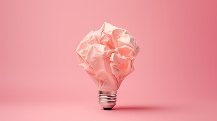  a light bulb with a crumpled pink paper on top of it.  generative ai