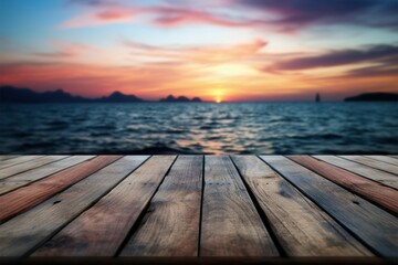 Fototapeta na wymiar Tranquil horizon A wooden table amid a stunning, blurred sea sunset