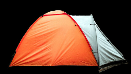 Medium sized camping tent isolated on black background. © Deki Prayoga