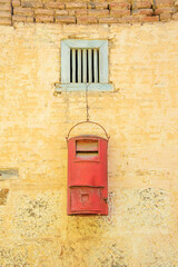 Indian old Post Box hanging on the wall, Wai, Maharashtra, India.