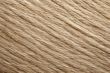 Close-up of hemp fabric texture, demonstrating the eco-friendly and sustainable qualities of this material for clothing and textiles. 