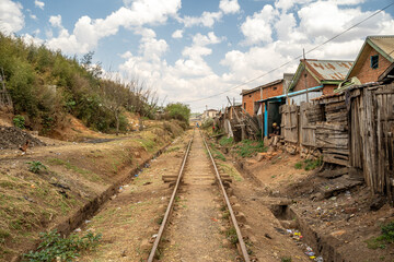 Fototapeta na wymiar abandoned railroad behind a village in rural Madagascar