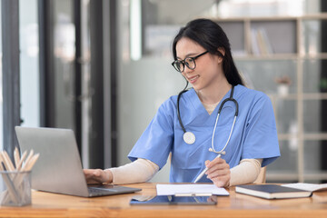Medicine women doctor holding clipboard and digital laptop, Medical technology and futuristic,...