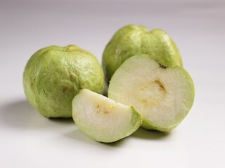 Crystal Guava (Psidium guajava) or Jambu Kristal, served in white ceramic square plate isolated in white background, copy space.