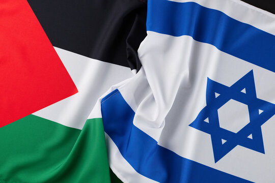 Understanding the Israel-Palestinian Authority Dispute. Top view photo of Palestinian flag, Israeli flag - Powered by Adobe