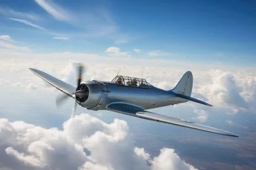 Foto op Canvas silver chrome fuselage. retro vintage single-engine airplane. Spinning propeller. Plaine in flight. Small generic WWII aircraft. Blue sky. Above the clouds. agricultural plane © ana