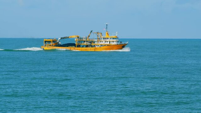 Fishing Boat Trawler Ship Sailing On Sea. Fishing Boat Sailed From The Coast. Real time.
