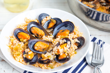 Delicious broth rice with mussels