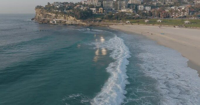 Aerial view of Bronte, a beachside Eastern Suburb of Sydney at sunset along the coastline, New South Wales, Australia.