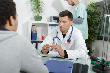 Fototapeta premium female doctor and patient consultation during medical exam