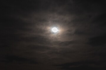 Beautiful cloudy and gloomy sky with shining moon - 663463594