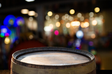 Red wine bottle and wine glass on wodden barrel. Beautiful Tuscany background. High quality photo