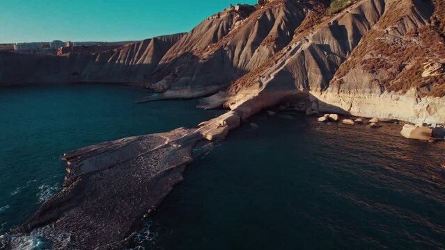 Aerial view of The Fourteen Soldiers Geological formation in Qarraba Bay, Mgarr, Malta.