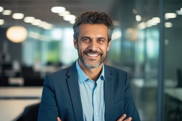 Fototapeta premium A confident man in a suit with crossed arms