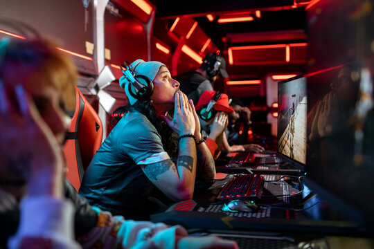 Young professional gamer experiencing defeat at the esport tournament venue