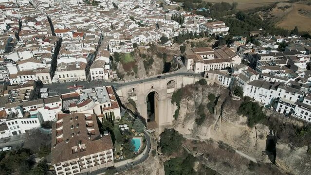 Aerial view of Ronda, a small Spanish municipality known for its striking suspension bridge and place of origin of bullfighting, Malaga, Andalusia, Spain.