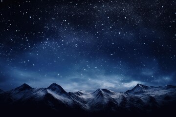 Obraz premium Mountain ridge silhouette against a backdrop of the Milky Way