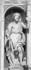 GENOVA, ITALY - MARCH 5, 2023: The statue of St. John the Baptist in the church Chiesa del Gesu by unknown sculptor from school of  Giuseppe Carlone from 17. cent. 