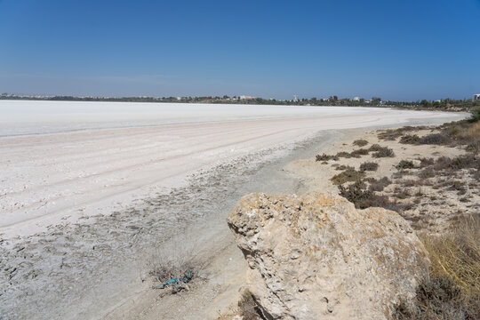 large dry surface of white salt from the salt water of the Mediterranean Sea, Cyprus.  Close to Larnaca airport.