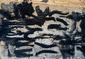 Abstract paint grunge background. Drty old cement wall with black paint stains 