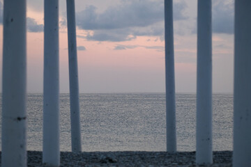 Sunset on the shore, cloudy evening