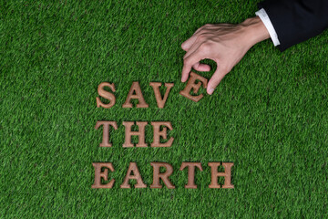 Eco awareness campaign for Earth day concept showcase message arranged in Save Earth on biophilic...