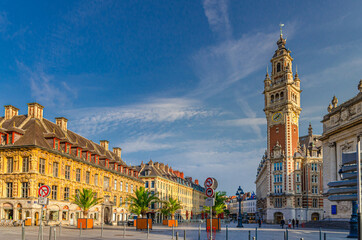 Lille cityscape with Place du Theatre square in historical city center, Vieille Bourse Old Stock Exchange flemish mannerist style building and Chamber of Commerce Nouvelle Bourse, Northern France