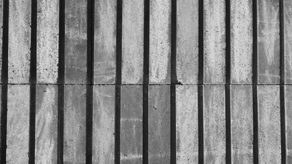 Grey stripped concrete wall background.