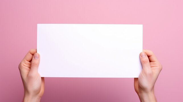 Hand of women holding blank white paper, isolated on pink background. AI generated image