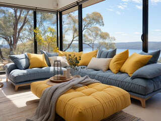 Scandinavian-inspired living room featuring a blue sofa with yellow accents, perfectly framed by a scenic floor-to-ceiling window overlooking the lake