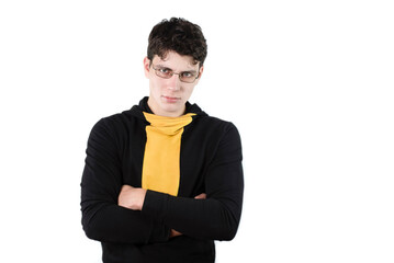 Teenage boy wearing glasses to improve vision, the boy is a little sad and angry because he has study a lot in college, he is already tired, too much responsibility for young boy