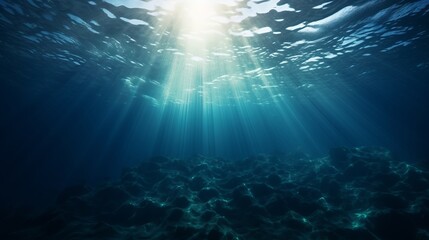 Fototapeta na wymiar Dark blue ocean surface seen from underwater, sunrays, underwater shot