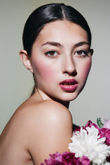 Naklejka premium make-up woman flower portrait model face beauty pink girl cosmetology blush