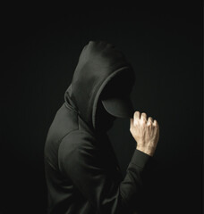 Black Hat Hoodie Sweater Man Hacker Alone in Dark