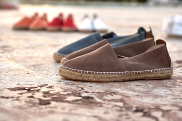 Naklejka premium Spanish espadrilles in the Dominican Republic of different colors ready to be sold