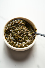 Purple Pesto. Pesto with fresh purple basil, pine nuts and parmigiano reggiano cheese and olive oil. 