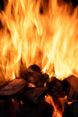 The orange-red fire burns with sparks. © jarizPJ