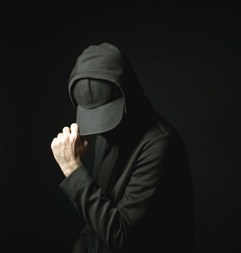 Black Hat Hoodie Sweater Man Hacker Alone in Dark