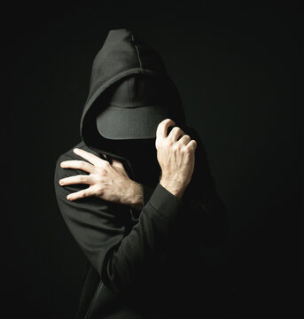 Black Hat Hoodie Sweater Man Hacker Alone in Dark