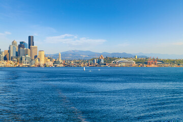 View of the Seattle Waterfront cityscape with skyscrapers, the Pike Place Market district, the...