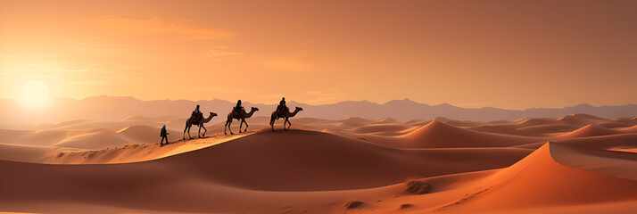 A Camel Caravan Moves Through the Vast Expanse of the Sahara Desert with Sunset in Background - obrazy, fototapety, plakaty