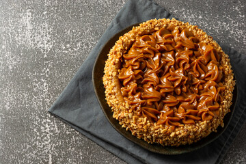 churros cake with dulce de leche on top. sweet cake dessert