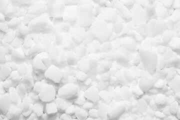 Coarse grain salt. Dishwasher salt texture. Granulated crystalline sodium chloride. Closeup grains. White granules background. Chemistry dry additive. Granular closeup. - obrazy, fototapety, plakaty
