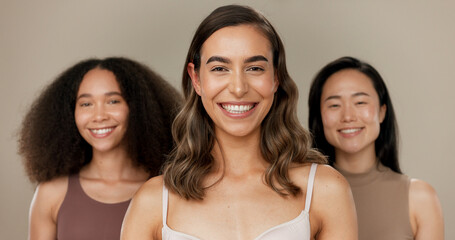 Beauty, diversity group and woman smile for facial cosmetics, self care wellness or dermatology makeup. Women empowerment, unique and happy portrait of model friends together on studio background