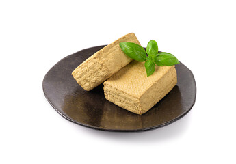 Tofu Cheese Isolated, Smoked Vegan Cheese Slice, Sliced Soya Bean Curd, Soy Protein or TSP