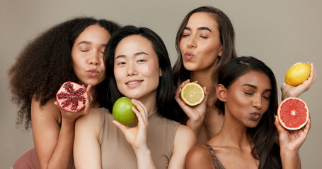 Women, portrait and beauty, diversity and fruit with dermatology and friends on studio background....