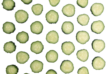 fresh sliced cucumber isolated on white background with clipping path, pattern with organic vegetables, top view, flat lay