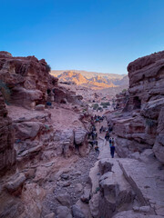 People on Ad-Deir Trail Monastery Route in the historic and archaeological city of Petra, Jordan