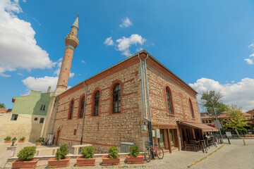 Fototapeta premium Old stone Mosque of Eskisehir in Turkey. Historically significant place of worship. Its elegant Ottoman architecture, it reflects city's cultural heritage