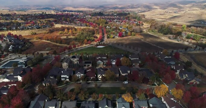 Aerial view of a residential neighborhood in the foothills with fall colors